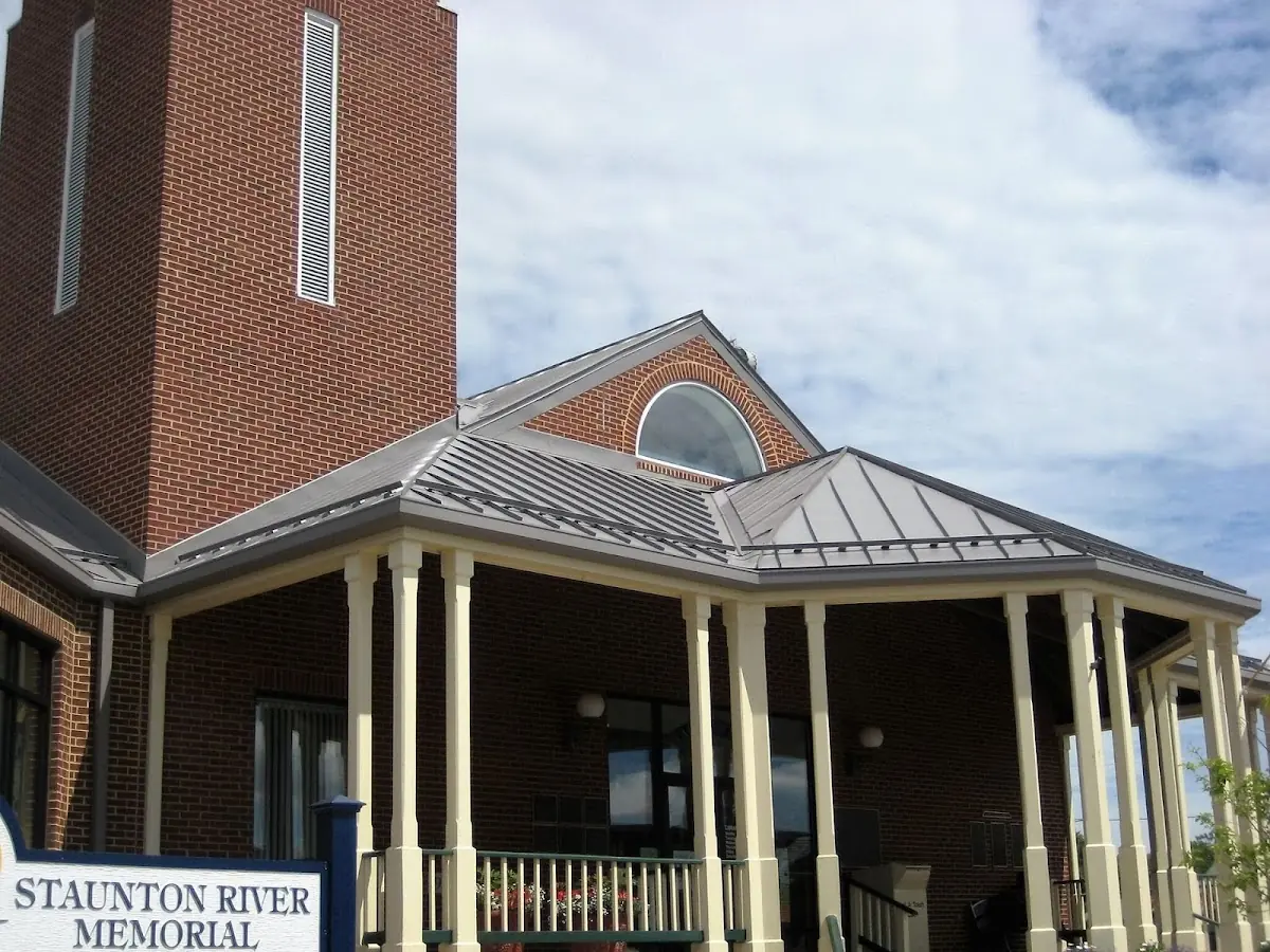 Skilled roofing craftsmen working on a residential roof in Netherwood